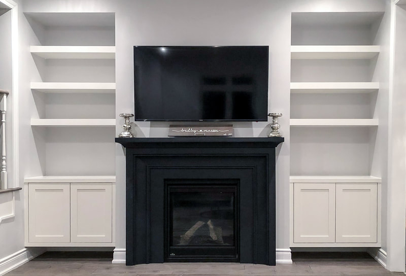Built-In shelving on both sides of fireplace