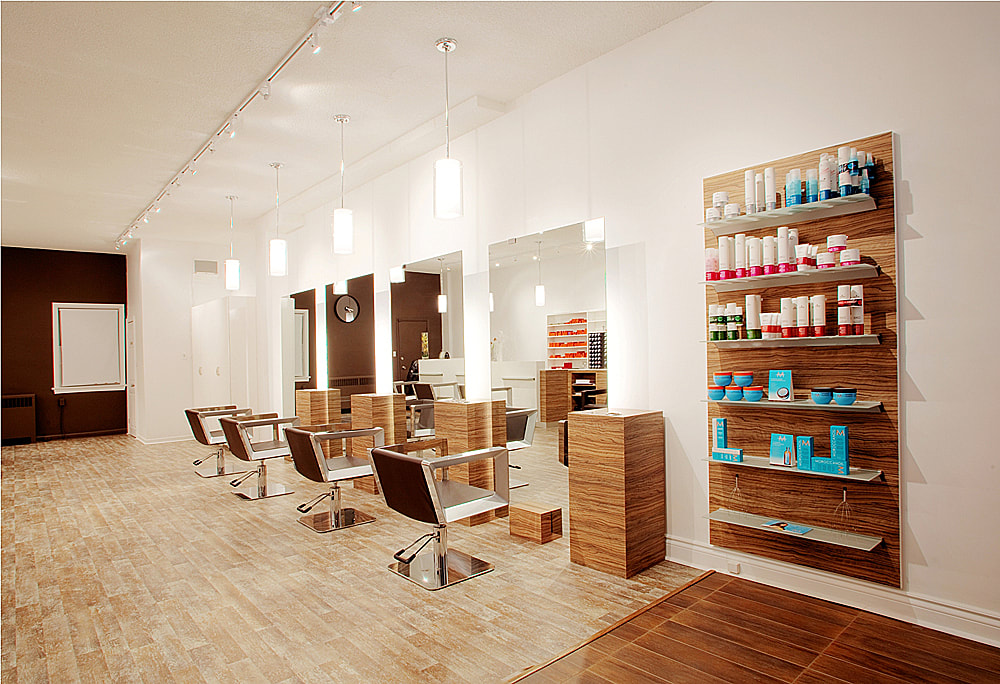 Hair salon styling stations and retail panel