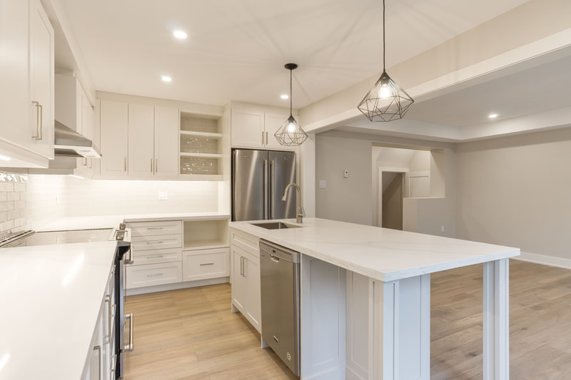 White + Grey Shaker Kitchen With Island Seating